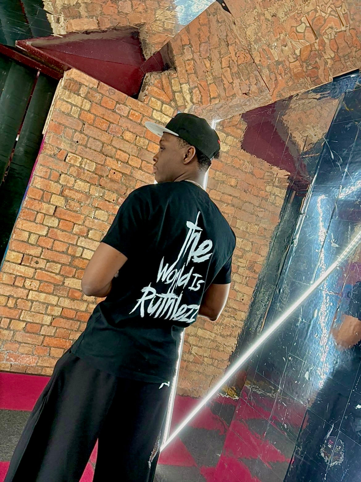 RK ‘The World Is Ruthlezz’ Tee